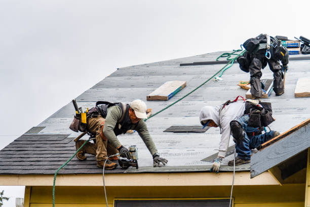 Professional Gutter Installation technician working in West Hatfield, MA